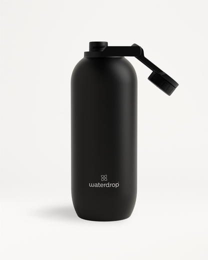 All-Purpose Thermo · Swing Lid black water bottle, vacuum-insulated for 24-hour cold refreshment, shown with attached cap for secure hydration.