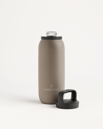 All-Purpose Thermo with Spout Lid, a double-walled stainless steel water bottle with a black cap and extra large opening for ice cubes.