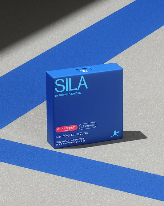 SILA Grapefruit electrolytes box with white text, designed for high performance and recovery, displayed on a striped surface.