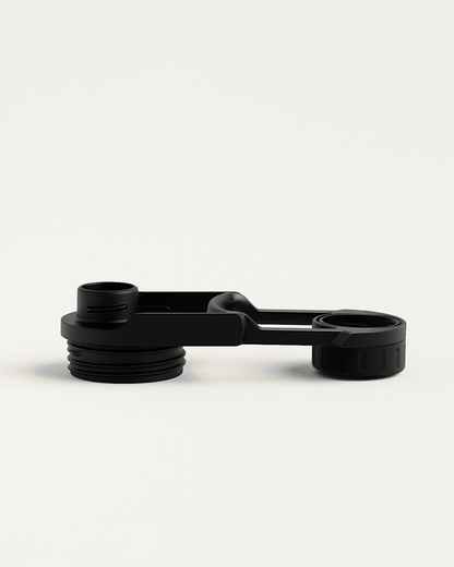 Swing Lid: Black cap with an attached round tube and hole, designed for secure, hygienic sipping on all-purpose bottles.