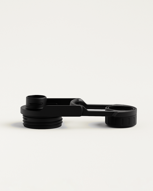 Swing Lid: Black cap with an attached round tube and hole, designed for secure, hygienic sipping on all-purpose bottles.