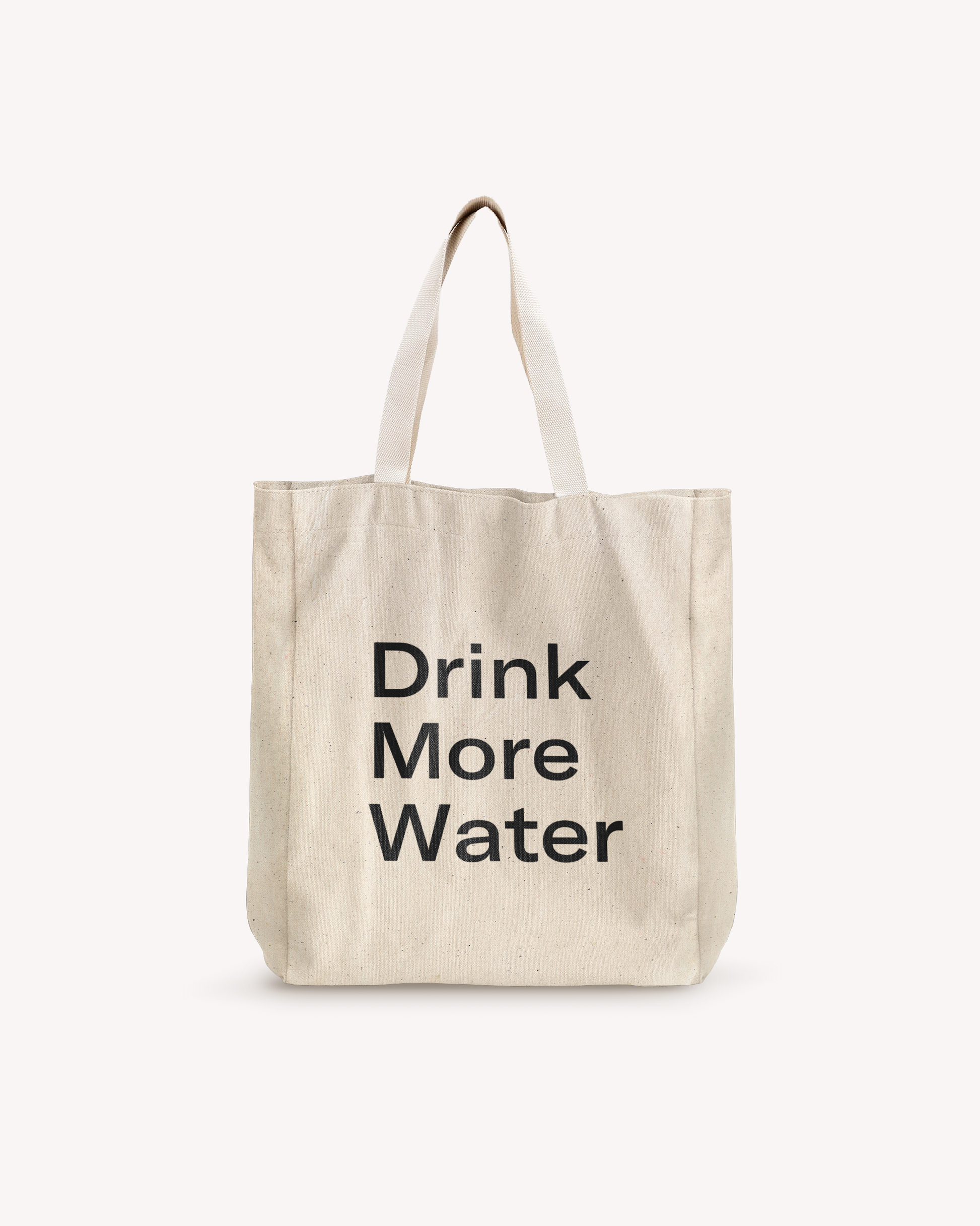 White cotton shopping bag with black text, featuring a sturdy white strap with a metal ring. Ideal for carrying a water bottle and essentials.